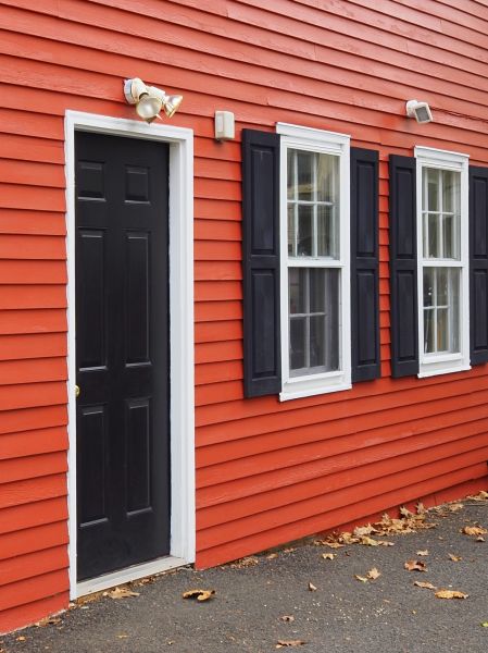 Red Vinyl Siding Installation in Sioux City